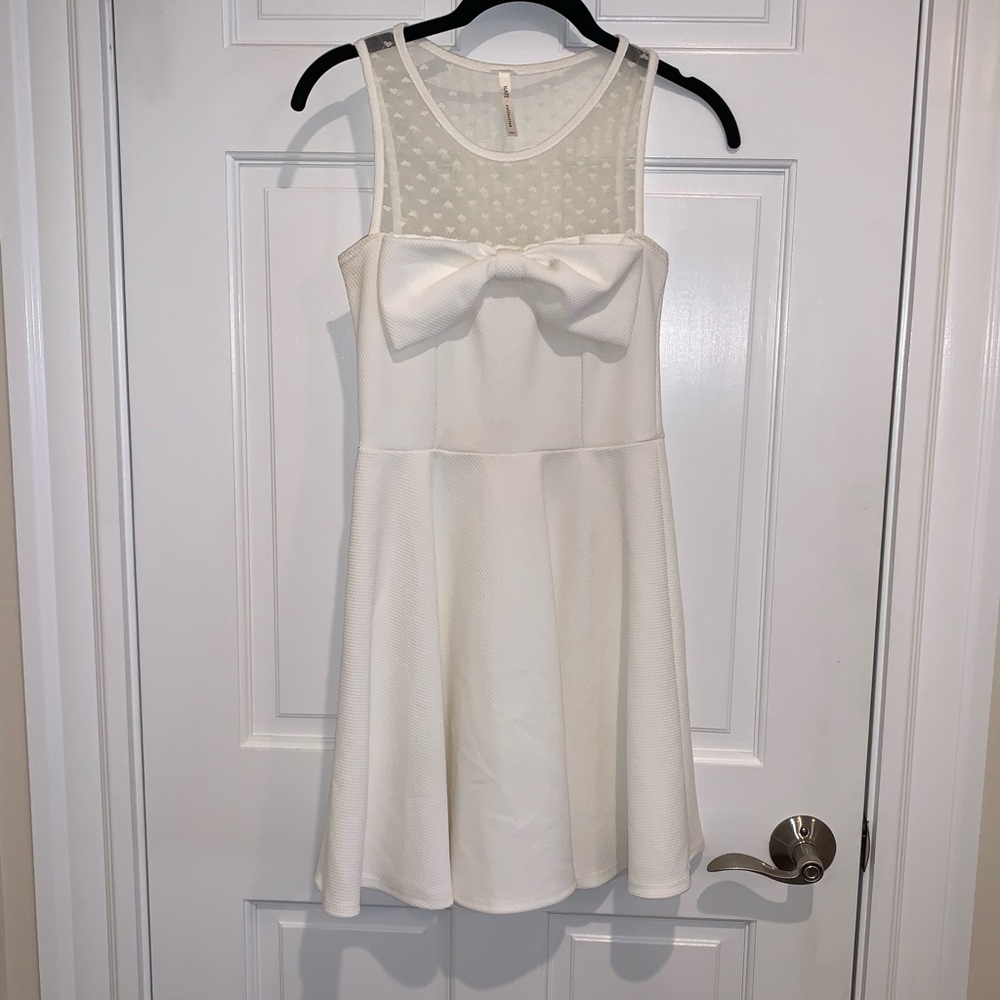 White Dress with Lace and Bow Details